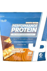 Trained by JP Performance Protein Smooth, Chocolate Caramel Nut flavor, high-quality whey protein for recovery and strength.